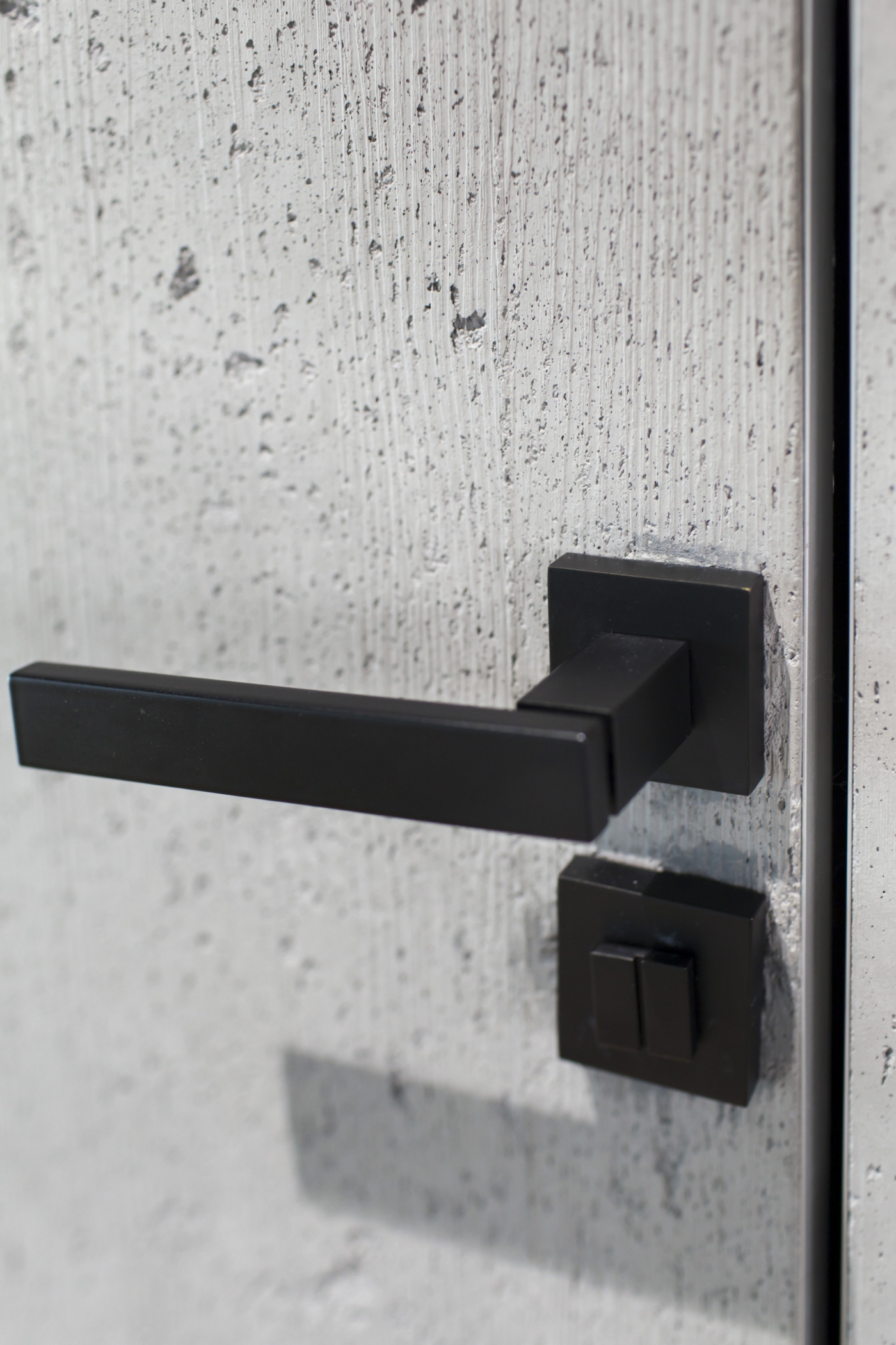 Concrete door trim handle